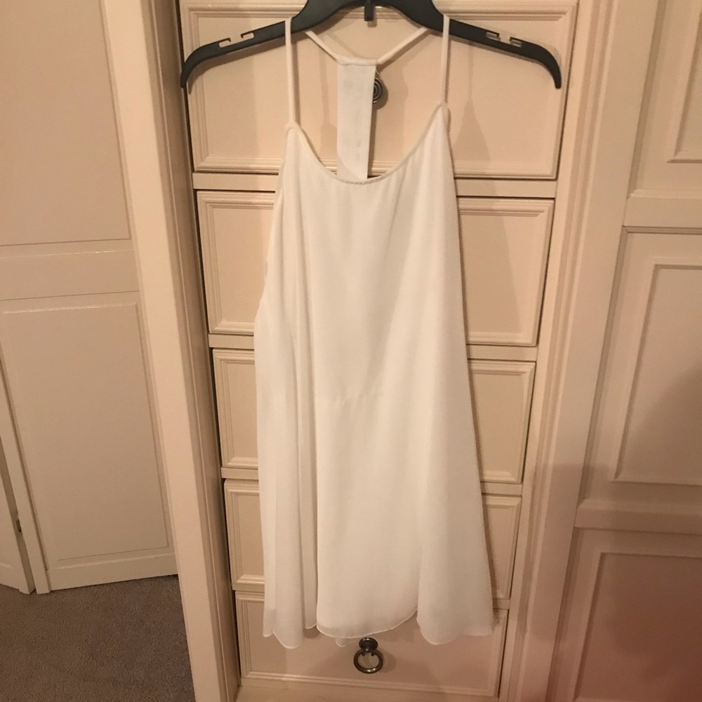 White dress with jeweled embellishment on back